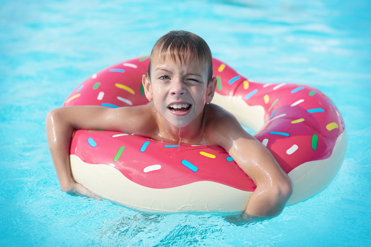 Rosa Donut-förmiger Schwimmring