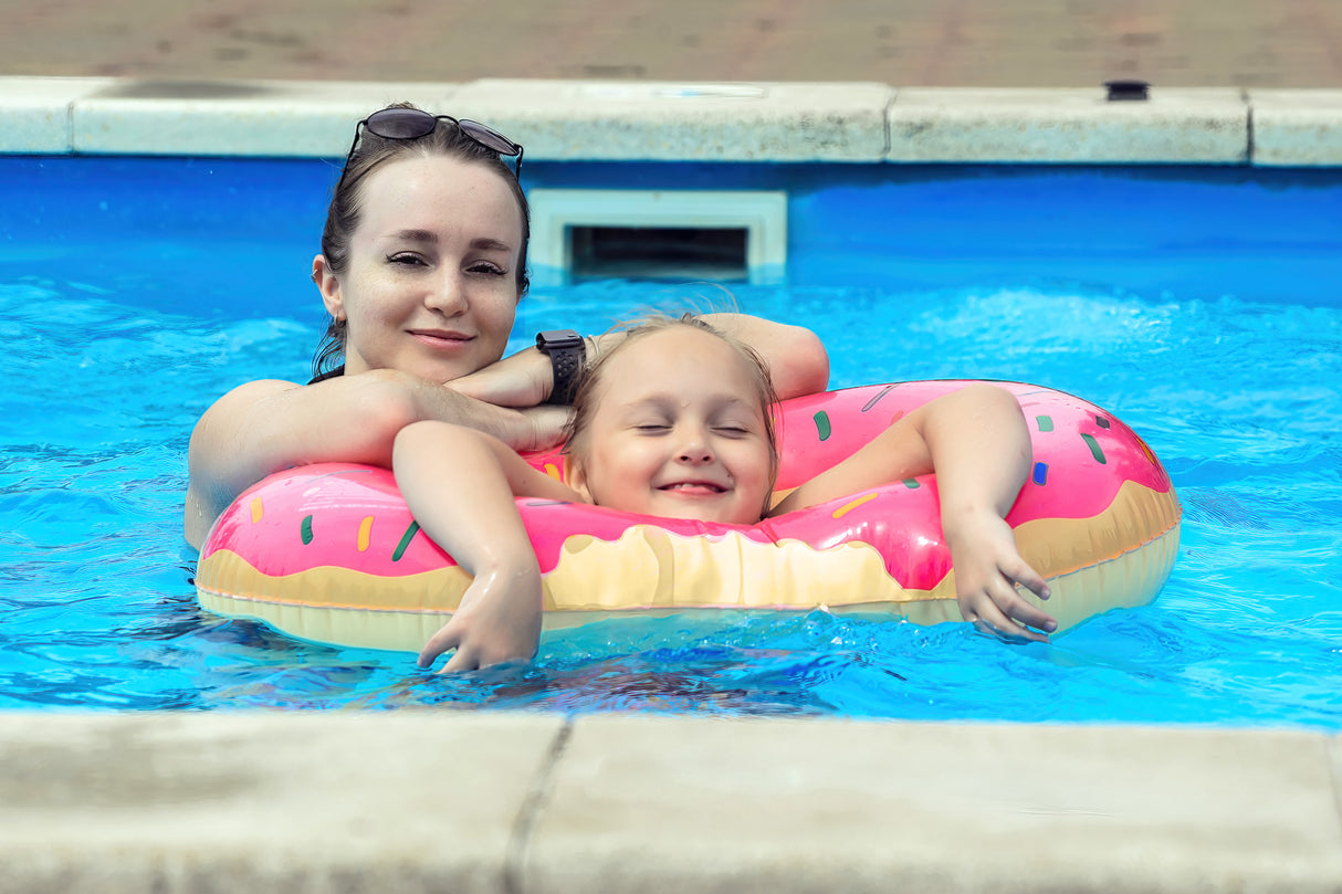 Rosa Donut-förmiger Schwimmring