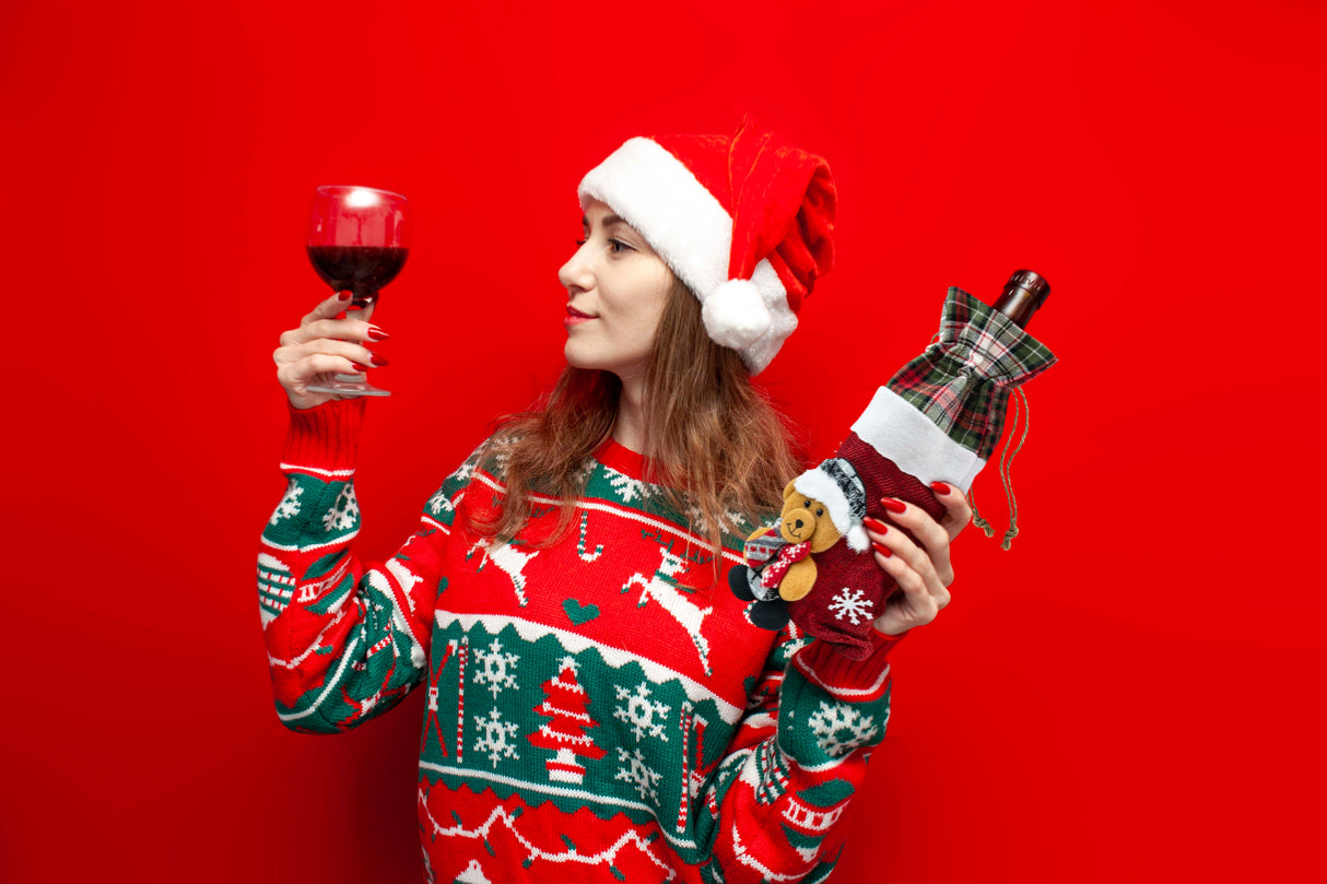 Weihnachtskostüm für einen flaschenroten Teddybären