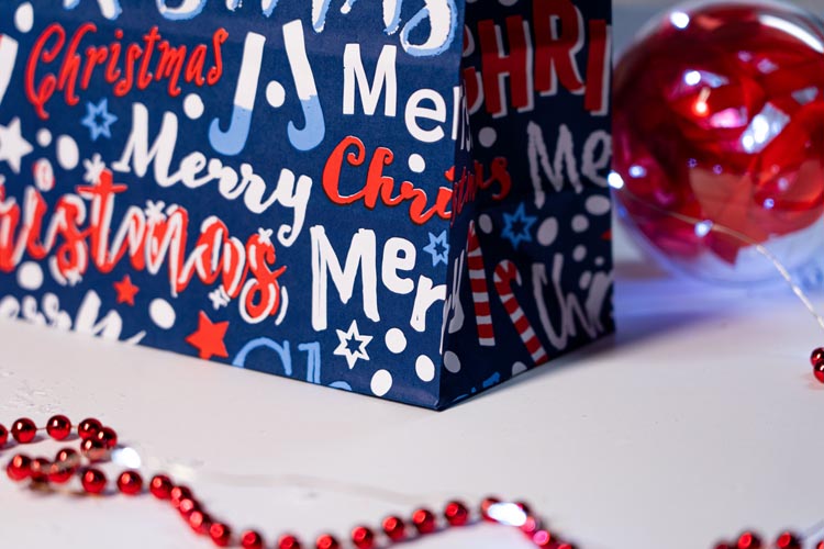 Weihnachtspapiertüte 240x100x320mm Marineblau Frohe Weihnachten