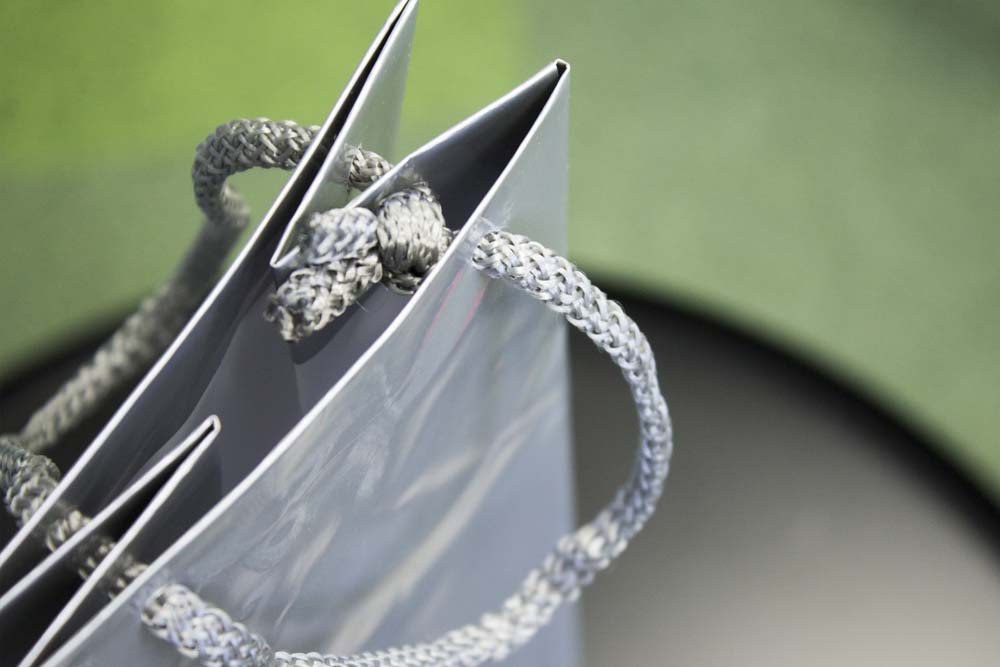 Laminierte Tasche mit Schnurgriff 110x90x400mm Silber