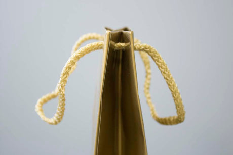 Laminierte Tasche mit Schnurgriff 110x90x400mm Golden