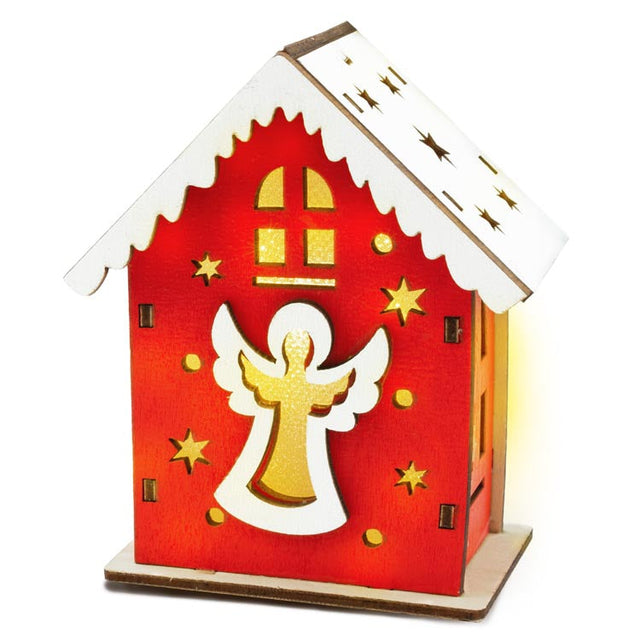 Rotes Adventshaus aus Holz mit Engel