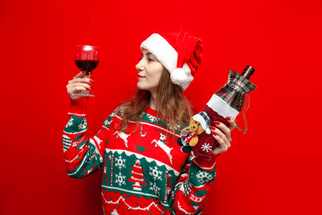 Weihnachtskostüm für einen flaschenroten Teddybären