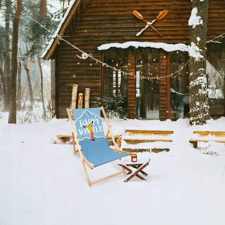 Liegestuhl aus Holz mit HAPPY WINTER-Aufdruck