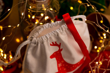 Weihnachts-Baumwollbeutel 210x200mm weiß mit Rentier-Aufdruck