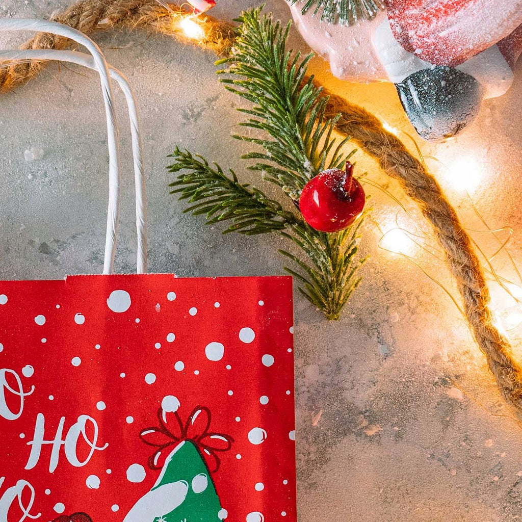 Weihnachtspapiertüte 180x80x220mm Roter Weihnachtself