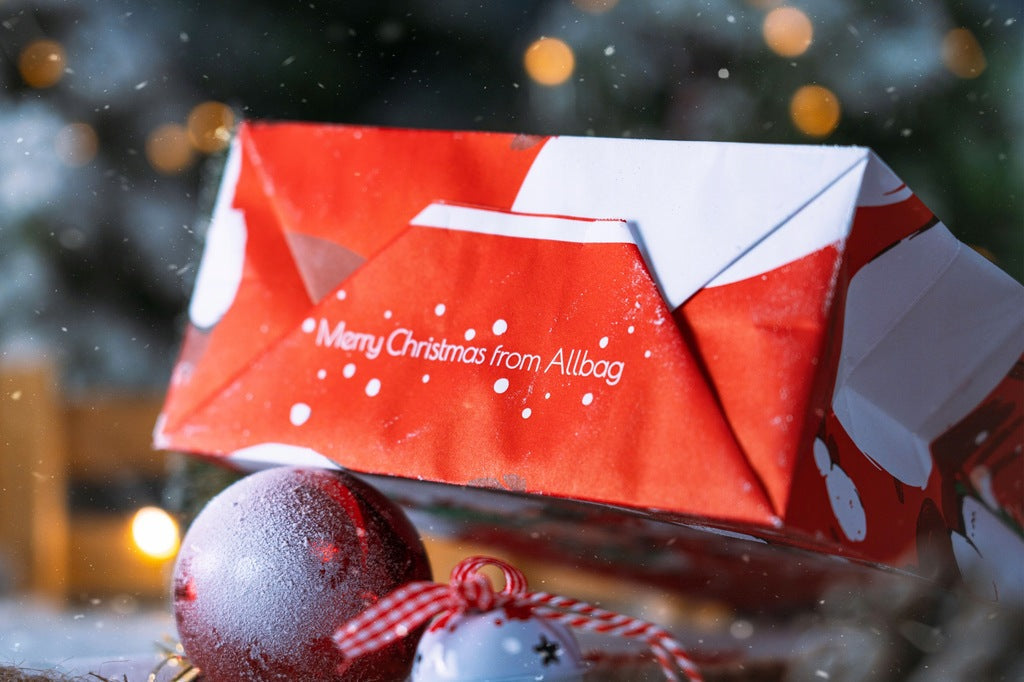 Weihnachtspapiertüte 180x80x220mm Roter Weihnachtself