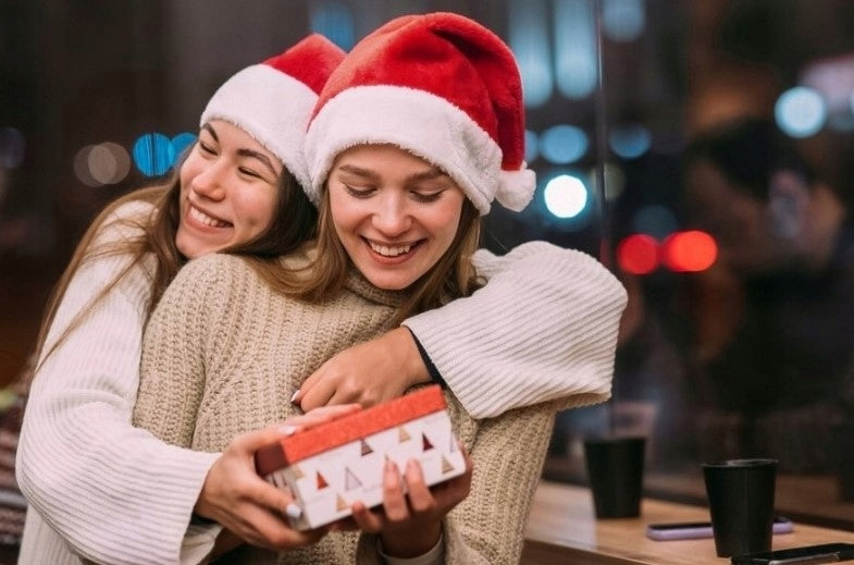 Rote Weihnachtsmannmütze mit weißem Bommel